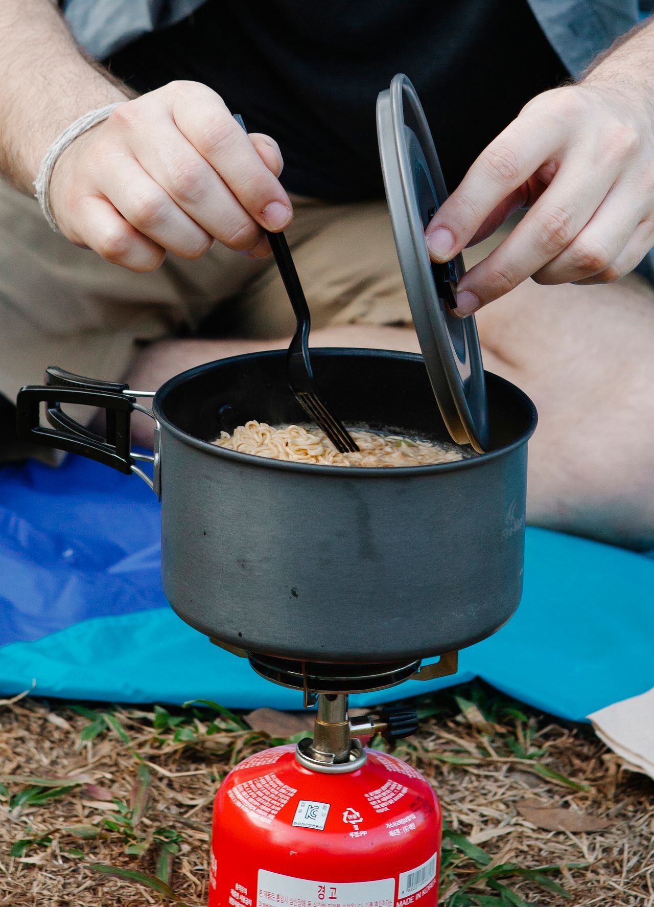 Backpacking stove fuel and cookware setup for trip planning