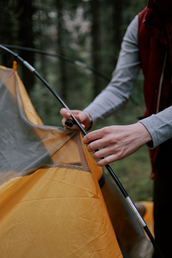 Freestanding tent pole clipped into a tent body