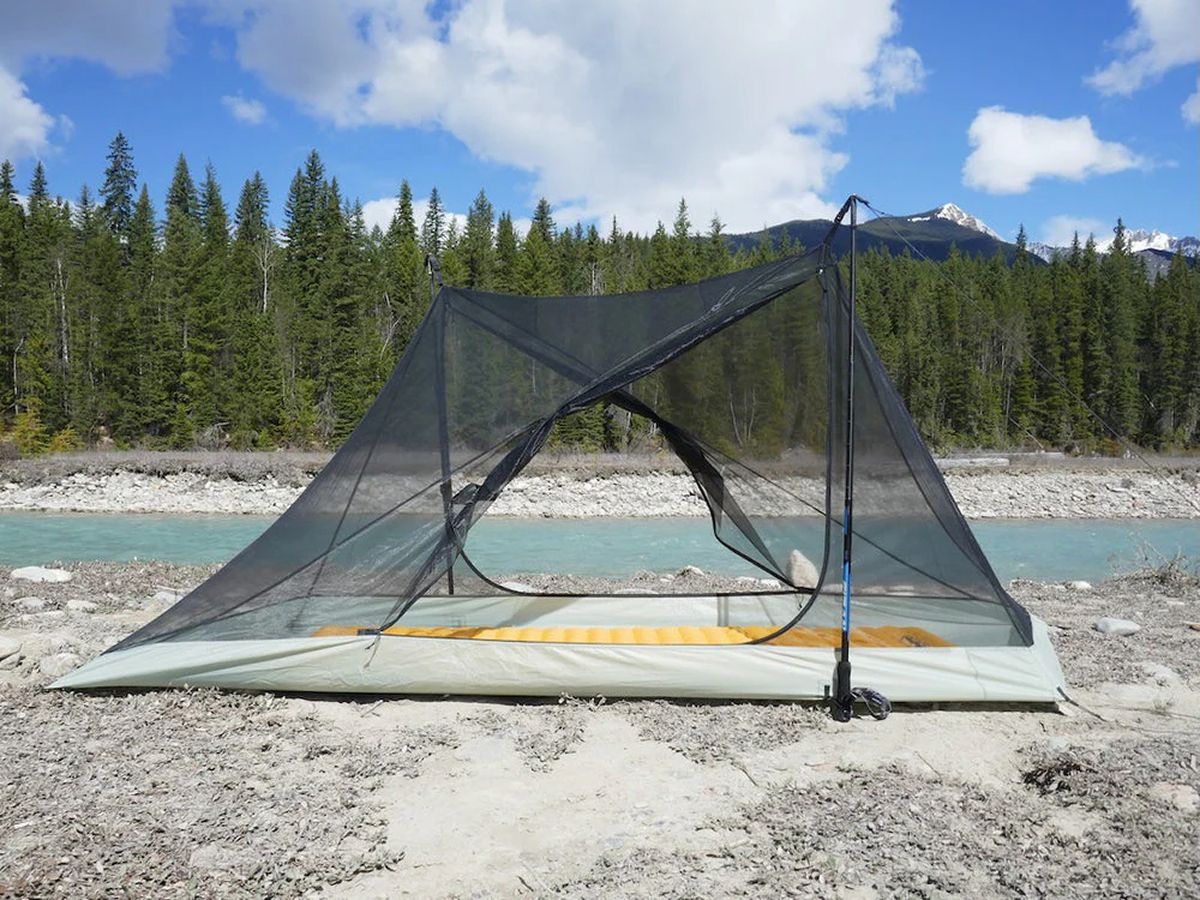 Trekking pole shelter pitched with poles and guylines
