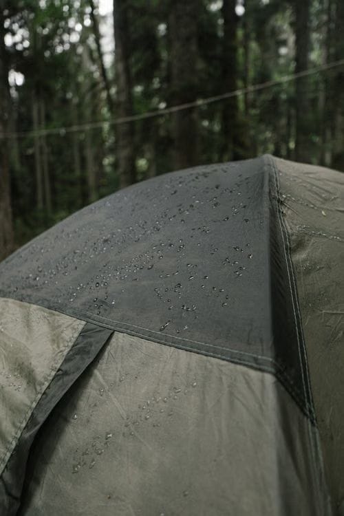 Broad condensation droplets collected across the inside of a tent fly