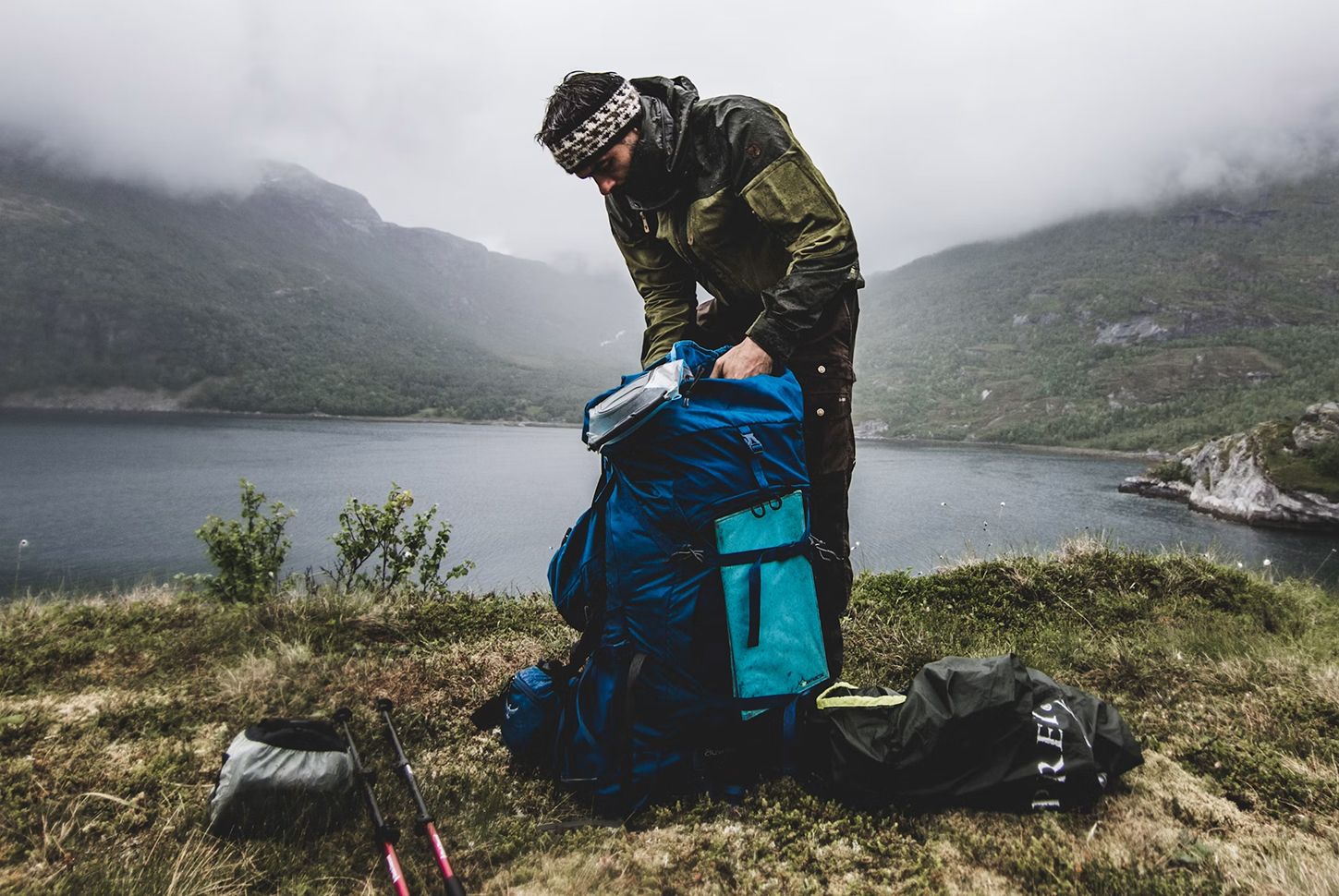 Backpacking gear laid out by volume before choosing a pack size